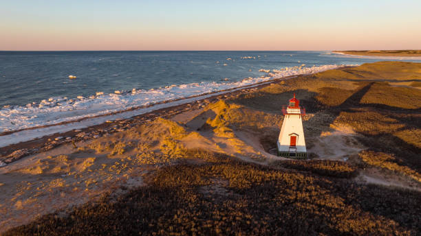 istock St. Peters Harbour Lighthouse at sunset 1388198825