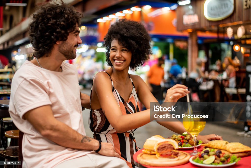 Tourist couple at the market Municipal Market of Sao Paulo Brazil São Paulo Stock Photo