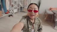 istock POV of Asian Teenage Girl Making Live Stream from Home 1388200235