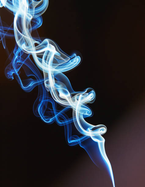 Smoke twirling as it rises into the air.