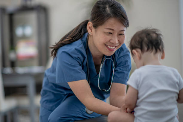 istock Pediatrician Giving a Baby a Check-Up 1388201580