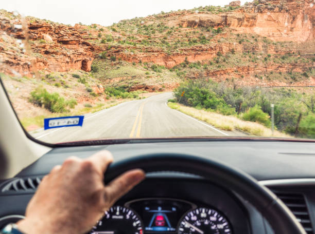 istock Driver point of view during rural Utah journey 1388202500