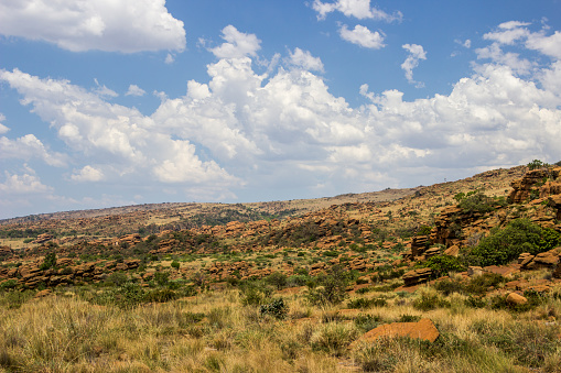 The Magaliesberg mountain is a small mountain chain in the Gauteng and North-west provinces of South Africa. The mountains consist predominantly of layers of shale, quartzite and dolomite of the Transvaal Supergroup which was uplifted and tilted about 2000 million years ago.