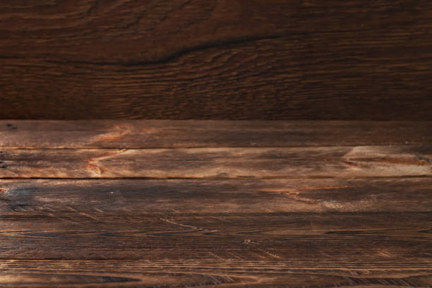 istock Dark old wooden table texture background 1388205783