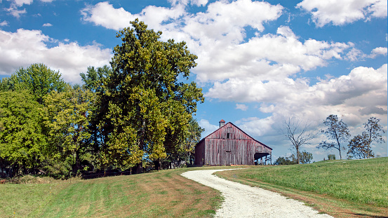 Rural countryside landscape of farmland with old barn