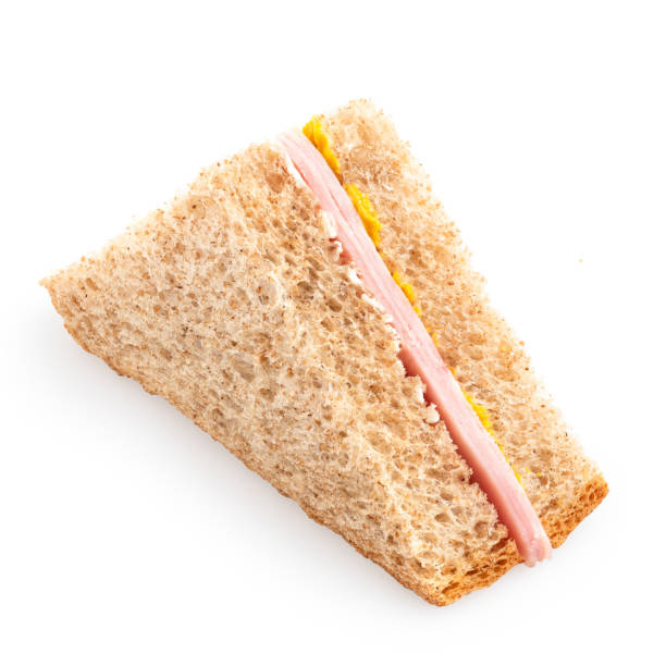 istock Ham and mustard wholewheat triangle sandwich. 1388205978