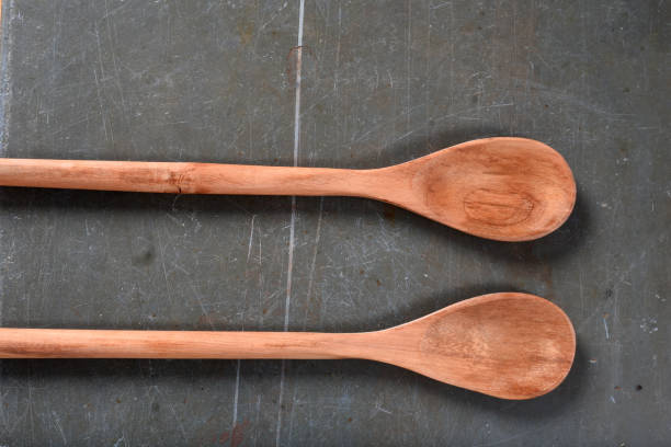 istock wooden spoon rustic object cooking utensil isolated top view 1388206976
