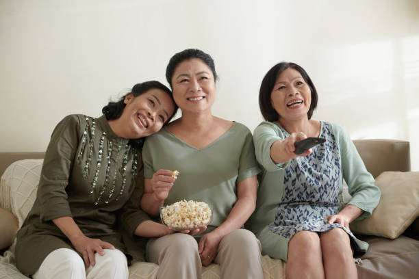 istock Elderly Women Watching Popular Show 1388206981
