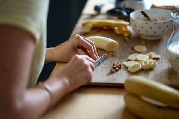 istock Young woman Preparing healthy breakfast 1388209961