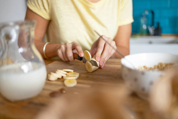 istock Young woman Preparing healthy breakfast 1388210096