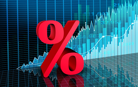 Higher interest rates and rising financing rate as an inflation or recession economic concept with a percentage icon on a stock market chart with 3D illustration elements.