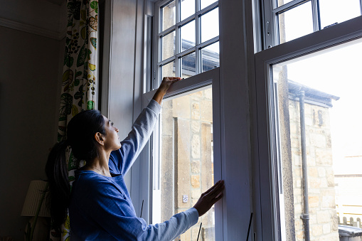 The woman closed her double glazed windows at her home in the North East of England in order to conserve energy when heating her home.