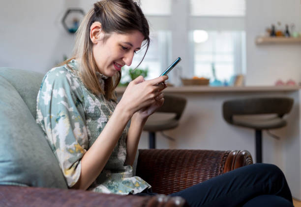 istock A visually impaired young woman  using smart phone. 1388212840