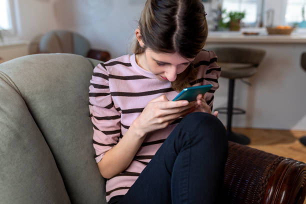 istock A visually impaired young woman  using smart phone. 1388212852