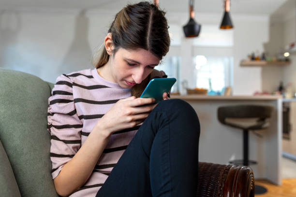 istock A visually impaired young woman  using smart phone. 1388212870