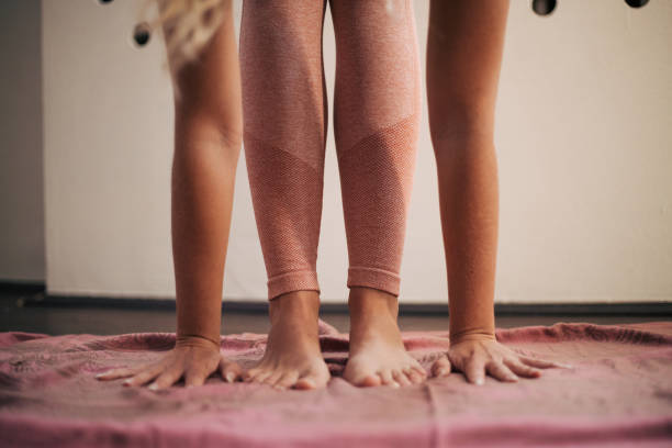 istock Blonde girl doing yoga. 1388213561