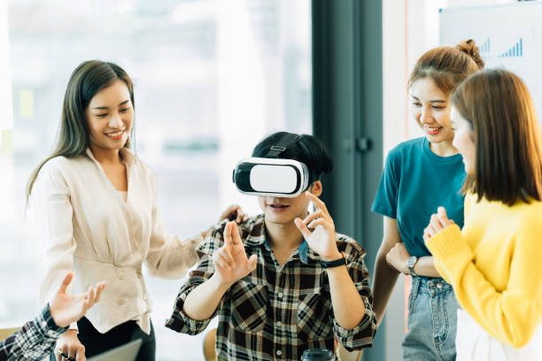 istock Start Up Team Of Freelancers In The Office Using VR 1388214591