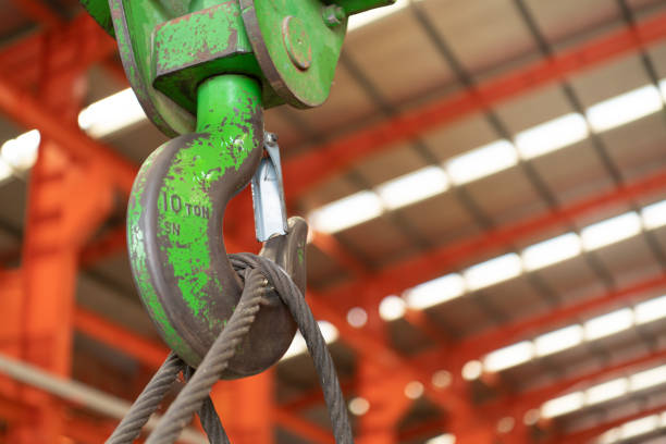istock Metal hooks for heavy industrial lifting applications. 1388214763