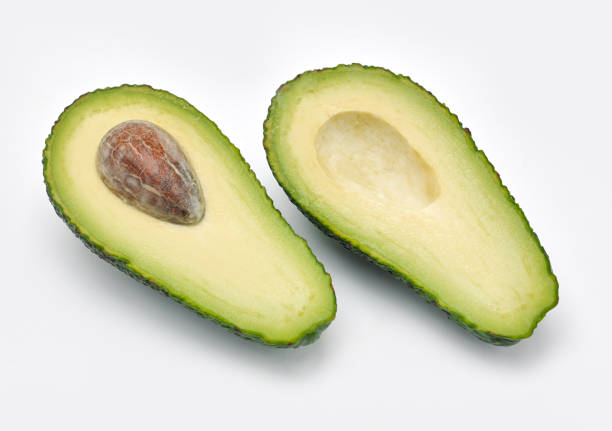 sliced avocado stock photo