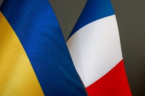 Flags of Ukraine and France. Political Relations concept.