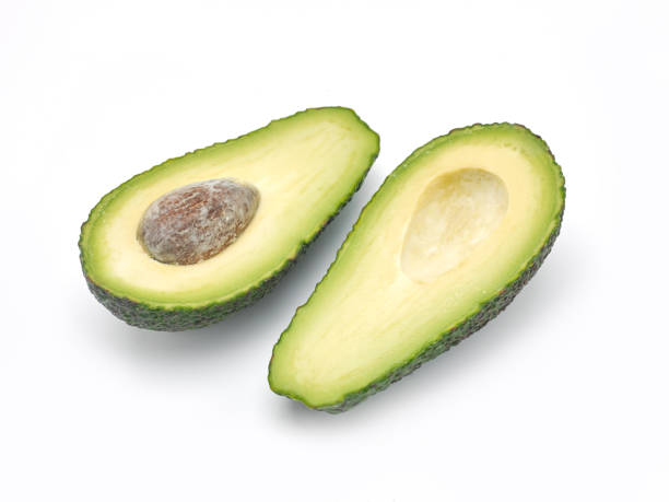 sliced avocado stock photo