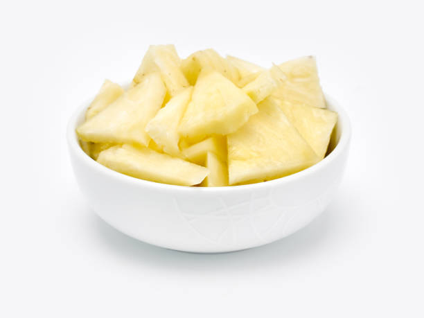 Pineapple and bowl stock photo