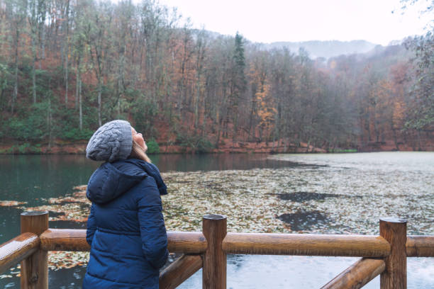 istock Enjoying in autumn by the lake 1388225049