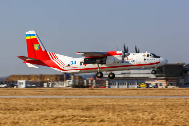 Ukraine Rescue Service Antonov An-26 airplane Stuttgart airport in Germany Stuttgart, Germany - March 4, 2022: Ukraine Rescue Service Antonov An-26 airplane at Stuttgart airport (STR) in Germany. antonov an 26 stock pictures, royalty-free photos & images