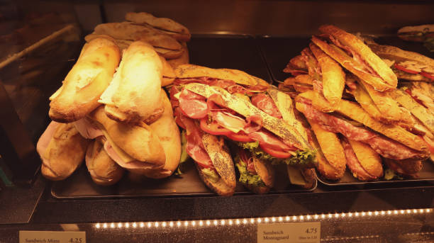 istock sandwich with lettuce, tomatoes prosciutto and cheese 1388226446