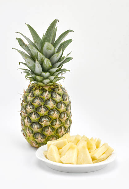 Pineapple and bowl stock photo