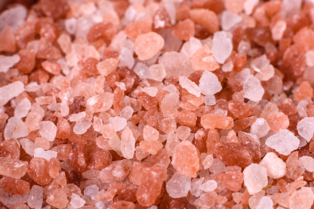 istock Pink and white large Himalayan salt in a white saucer 1388228232