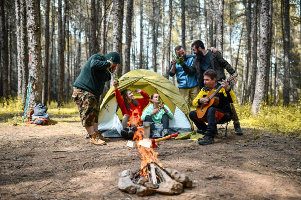 istock Campers Getting Drunk During Party And Neglecting Dangerous Fire 1388230721