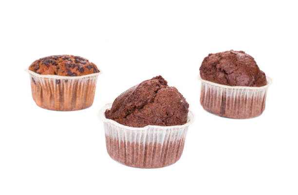 istock Two chocolate muffins and one chocolate chip muffin. 1388234517