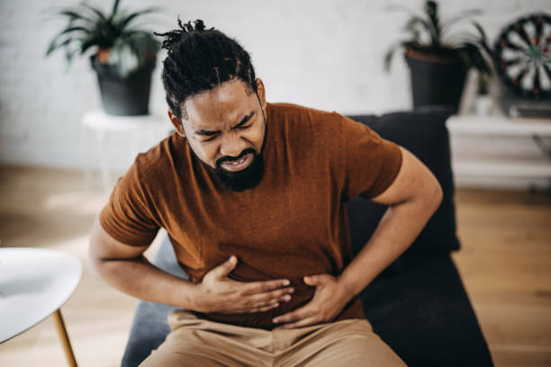 istock Mid adult man having a stomachache 1388235077