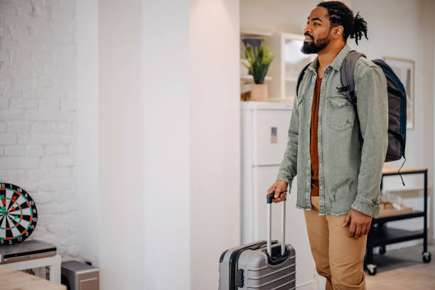 istock Black Man enters a rented apartment 1388235183