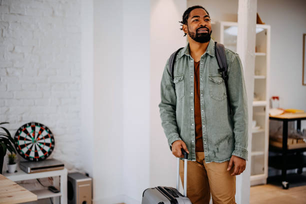 istock Black Man enters a rented apartment 1388235237