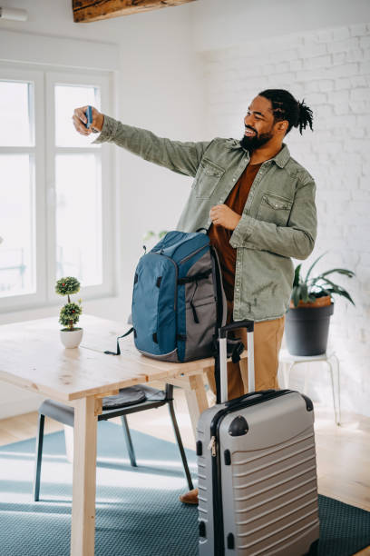 istock Black Man enters a rented apartment through Airbnb 1388235285
