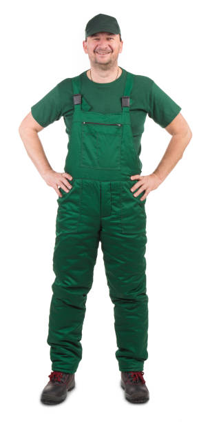 istock Worker in green overalls. 1388235707