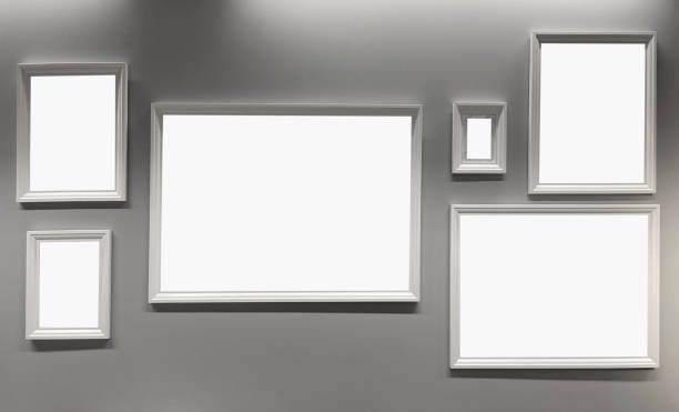 istock Picture frames hanging on the wall (Frames with Clipping Path) 1388238210