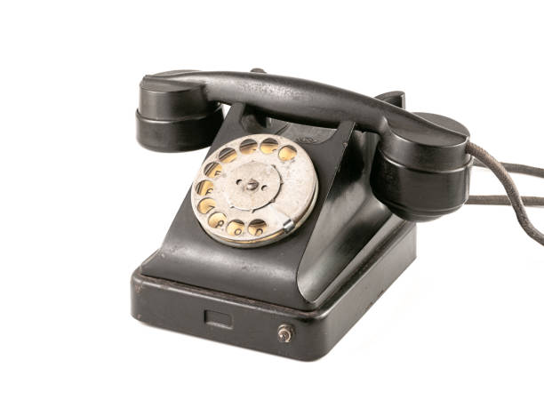 istock Old vintage disk wired  telephone isolated on white. 1388240910