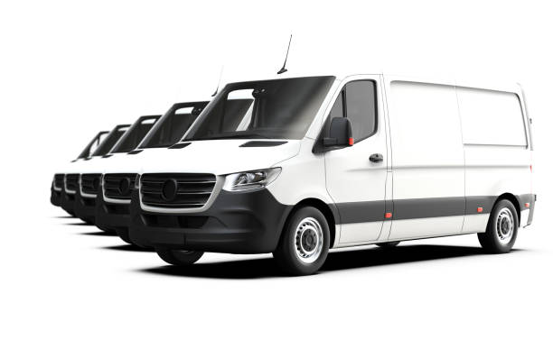 istock Fleet of white generic and unbranded vans on a white background 1388241800
