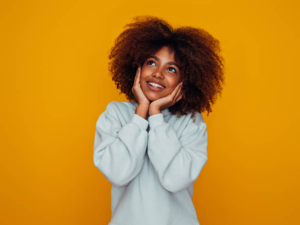 istock Beautiful girl with curly hairstyle 1388241978
