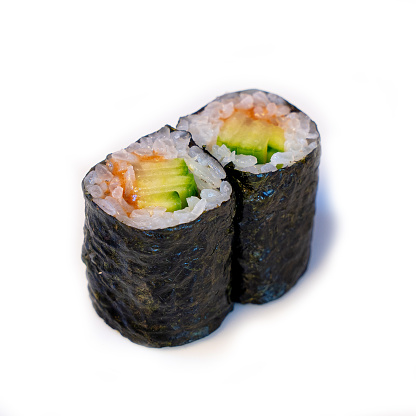 Sushi roll pieces with cucumber and plum. traditional Japanese cuisine,