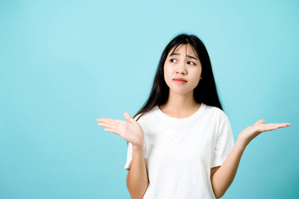 istock Portrait of girl's face expression feeling question and wondering. 1388243422