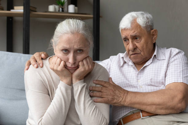 istock Upset elder husband comforting offended hurt senior wife 1388244227