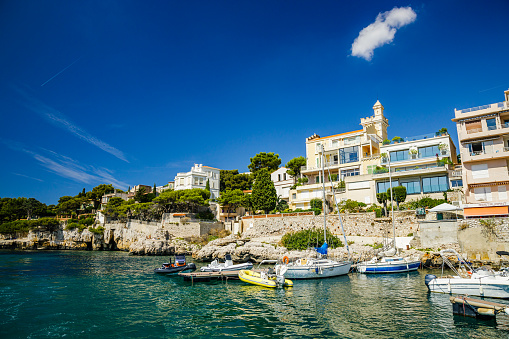 Holiday apartment buildings along the coast of Cassis on a summer day in Provence, France