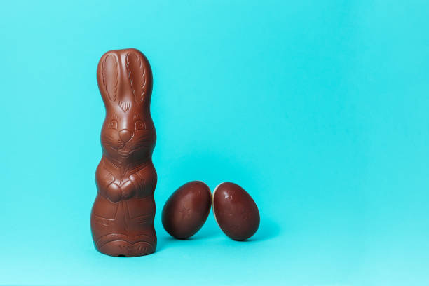 istock Easter Chocolate Bunny with Eggs on Turquoise Background Creative Easter Holiday Concept.jpg 1388246049