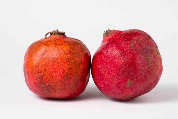 istock close up of red pomegranate harvested in peru 1388246061