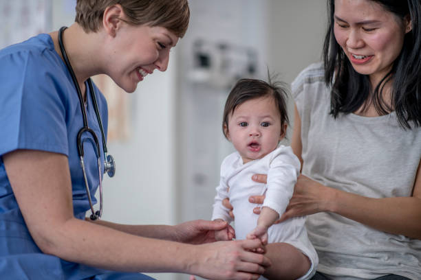 istock Mom and Baby Check-Up 1388249765