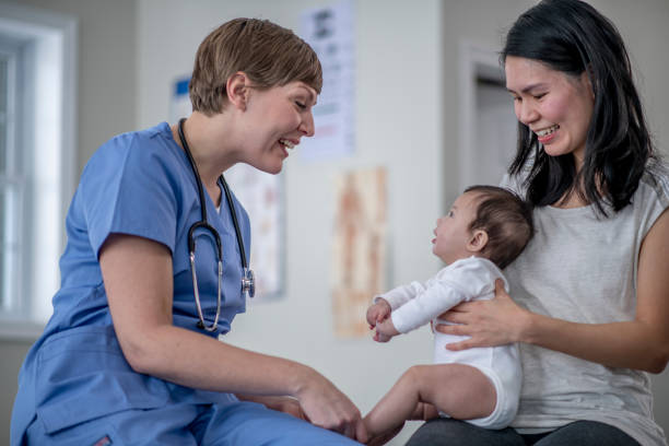 istock Mom and Baby Check-Up 1388249766